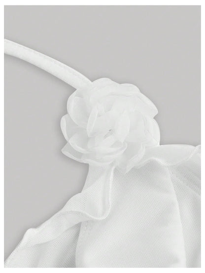 WDIRARA Women's 3D Flower Tie Front Ruffle Trim Halter Top Tie Backless Camisole